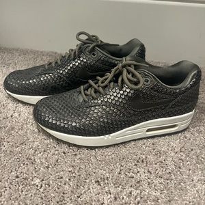 Woman’s Nike Air Max 1 premium reptile metallic pewter